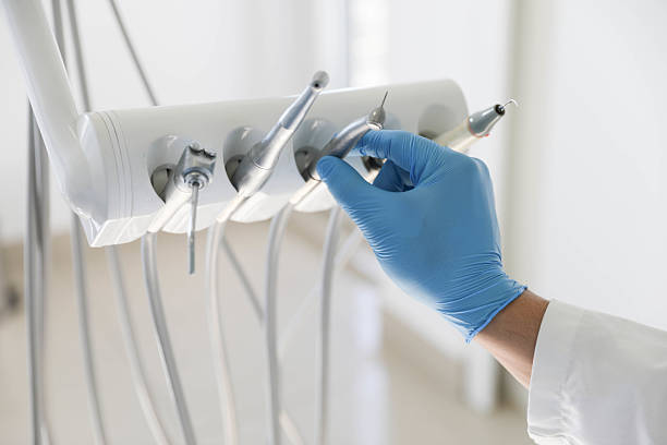 Professional Tooth Extraction technician working in Fort Walton Beach, FL